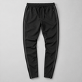 Black tapered tech joggers with zip ankle cuffs